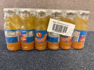 lot 133 image: 24 Bottles Of Hit Mango Juice