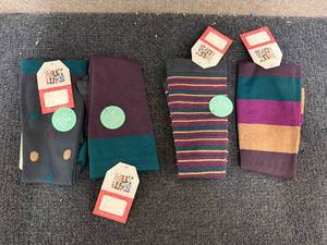 lot 299 image: 4 Pairs Of Jeweled Muk Luks Socks