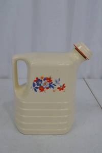 lot 40 image: Universal Cambridge pottery jug with floral motif