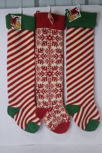 lot 11 image: 3 World Market Knit Christmas Stockings - Red, Green and White