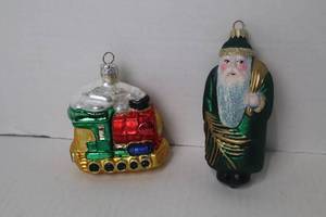 lot 19 image: 2 Christmas Glass Ornaments Santa Figure & Train