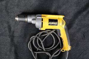 lot 123 image: Corded Drill - DeWalt DW236 12 Inch VSR