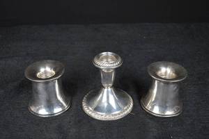 lot 214 image: Three-Piece Weighted Sterling Candle Holder Set