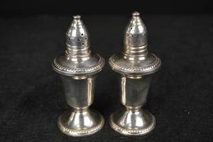 lot 218 image: Salt & Pepper Shakers - Weighted Sterling Silver, Urn-Shaped with Beaded Bases