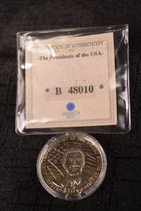 lot A-253 image: George W. Bush $10 Commemorative Coin (Liberia Issue) - The Presidents of the USA, The American Mint