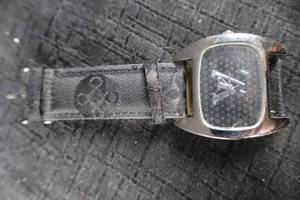 lot 312 image: Louis Vuitton Watch - Monogram Dial & Fabric Strap