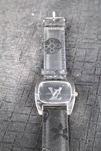 lot 312 image: Louis Vuitton Watch - Monogram Dial & Fabric Strap