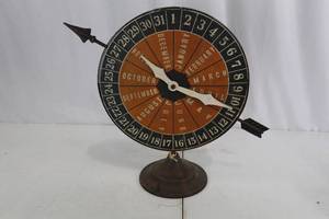 lot 365 image: Calendar Wheel - Vintage Metal Stand with Months & Day Ring