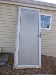 lot 8 image: Pella Glass Storm Door