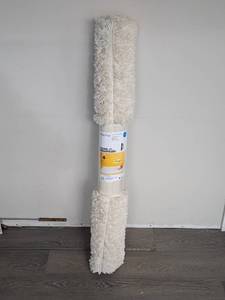 lot 171 image: NEW ROOM ESSENTIALS AREA RUG (4x56) IVORY