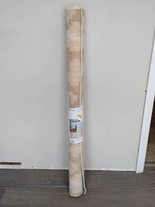 lot 187 image: NEW ROOM ESSENTIALS AREA RUG (4x56) TAN LEOPARD PRINT