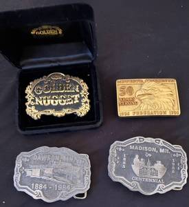 lot 92 image: Four Collectible Metal Belt Buckles