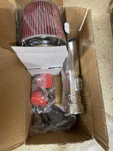 lot 229 image: Aftermarket Cold Air Intake Kit with Red Filter