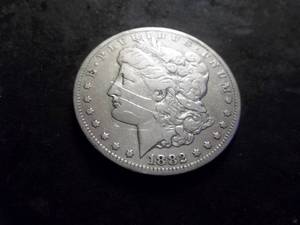 lot 5 image: 1882 CC Morgan Silver Dollar