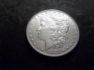 lot 10 image: 1884 Morgan Silver Dollar