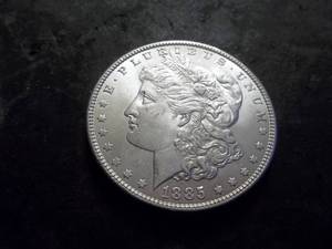 lot 11 image: 1885 Morgan Silver Dollar