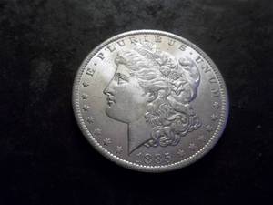 lot 12 image: 1885 O Morgan Silver Dollar