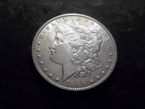 lot 13 image: 1886 Morgan Silver Dollar