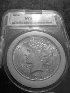 lot 29 image: 1924 Peace Silver Dollar Graded