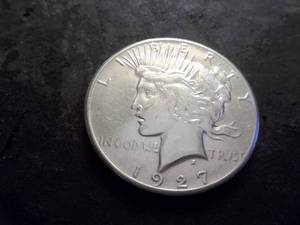 lot 32 image: 1927 Peace Silver Dollar