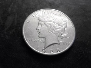 lot 34 image: 1928 S Peace Silver Dollar