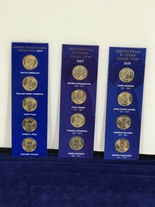 lot 243 image: 3 - Cards of One Dollar Presidential Coins  - 12 Coins Total