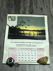 lot 312 image: Collectible 1970 Ducks Unlimited Sports Gear Inc. Calendar with Les Kouba Print - Mallards at Dawn
