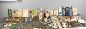 lot 357 image: Knitting Needles - Rabbit Pin Cushion - Thread - Rotary Cutter - Tutsi Basket with Little People - Embroidery Hoops and More