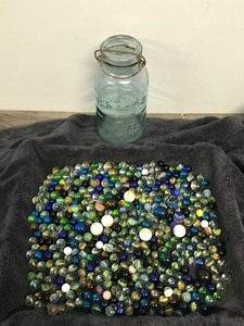 lot 446 image: Lot of Collectible Marbles in a Vintage Atlas Jar