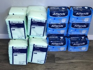 lot 448 image: New in the Package - Diapers & Pads for Adults - see description for more info