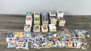lot 178 image: Lot of Collectible Baseball Cards - Rod Carew - Yogi Berra - Mark McGuire - Kirby Puckett - Tony Gwynn - Roger Clemens and More