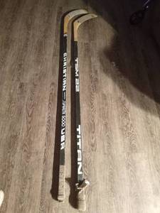 lot 139 image: Titan TSM 22 and Christian Superlite 5000 hockey sticks