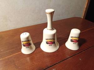 lot 97 image: Indy race car bell and salt 7 pepper shaker set