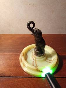 lot 90 image: Vintage 1930s cast metal elephant mounted on a round base made of Uranium Slag