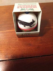 lot 79 image: Signed Les C. Kouba tree ornament bobber with a northern pike on it