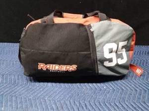 lot 58 image: Raiders duffle bag