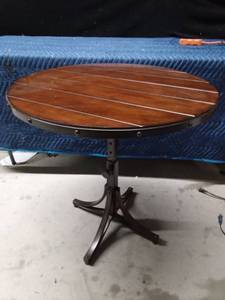 lot 21 image: Solid wood accent round table with adjustable metal frame - smoke free