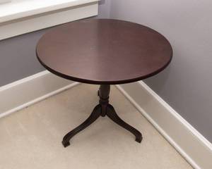 lot 69 image: Oval Tilt-Top Pedestal Side Table  Bombay Company