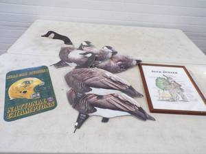 lot 42 image: Hunting Artwork, Goose Decoys and Bison 2011 National Champions Sign