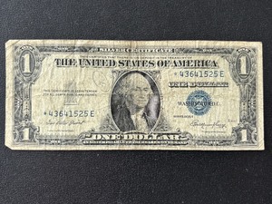 lot 28 image: 1935 E Blue Seal $1 Dollar Silver Certificate Star Note