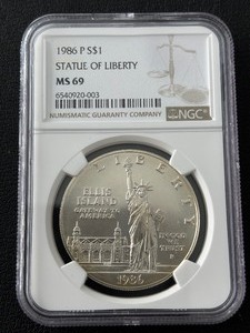 lot 32 image: 1986-P Statue of Liberty Silver Dollar NGC MS69