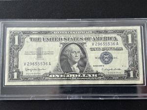 lot 125 image: 1957 B Blue Seal $1 Dollar Silver Certificate