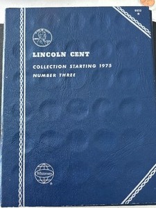 lot 161 image: Lincoln Cents and Book