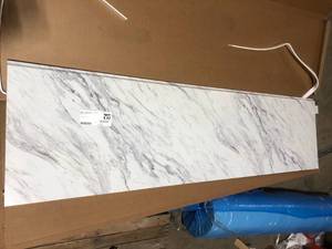 lot 61 image: Hampton Bay 8 ft Straight Laminate Countertop Kit Included in Gloss Calcutta Marble with Full Wrap Ogee Edge & Backsplash Customer Returns See Pictures