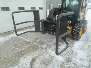 lot 94 image: Wolverine Skid Steer Bale Squeeze