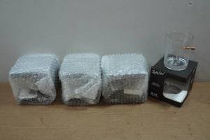 lot 53 image: 4 Lucky Shot Whiskey Glasses with Embedded Bullets