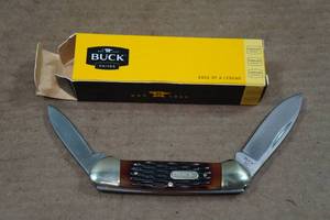 lot 144 image: Buck Knives Folding Knife
