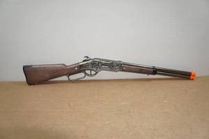 lot 215 image: Winchester Silver Boy Lever Action Kids Toy Rifle