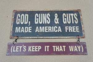 lot 259 image: Novelty Metal Sign - Gods Guns & Guts