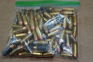 lot 348 image: 79 Loose Rounds - 10mm, .45, .380, 9mm Court, .40, .357, .32